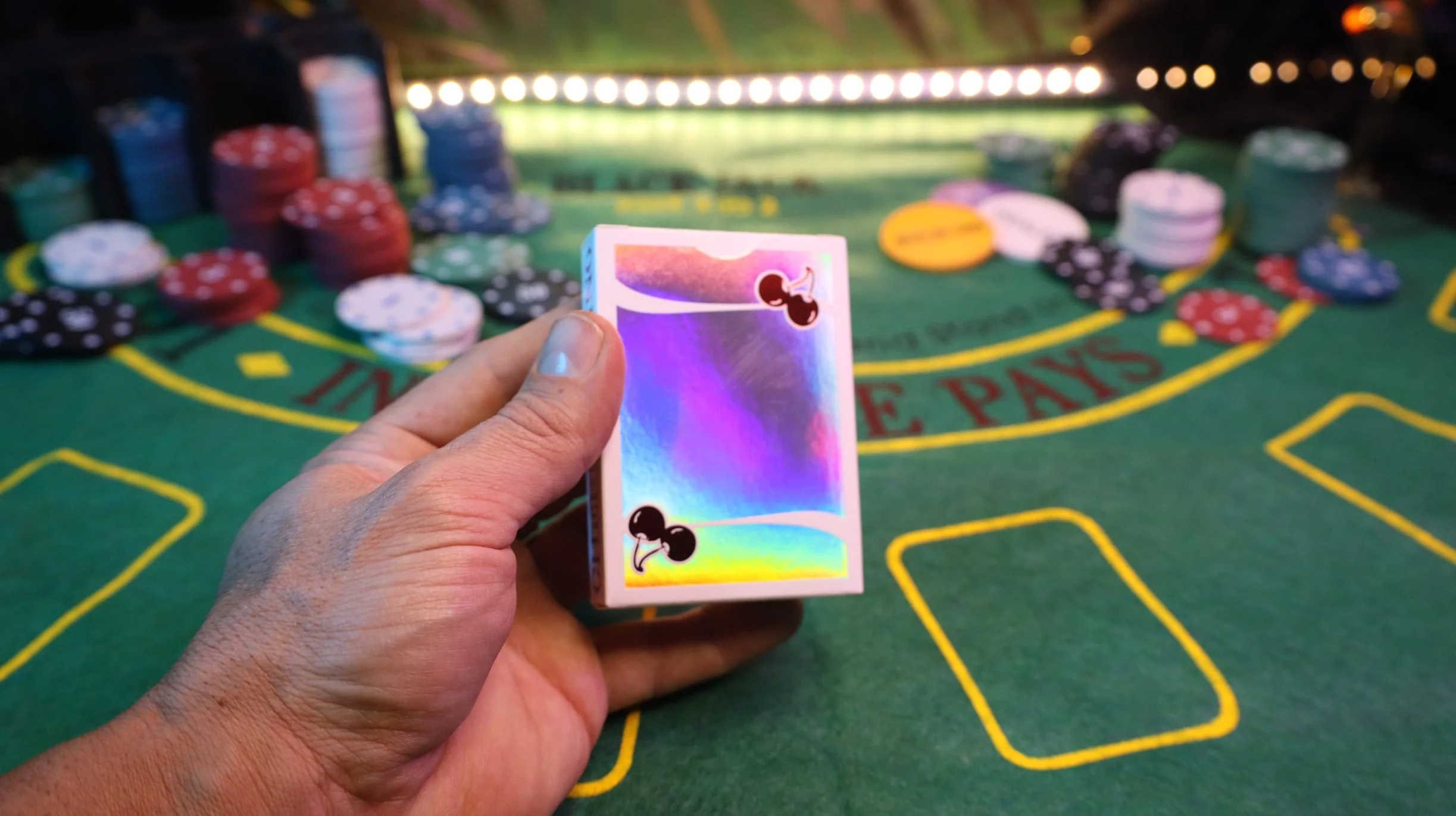 1612-cherry-casino-sands-mirage-holographic-world-s-first-double-hot-foil-playing-cards-1.webp