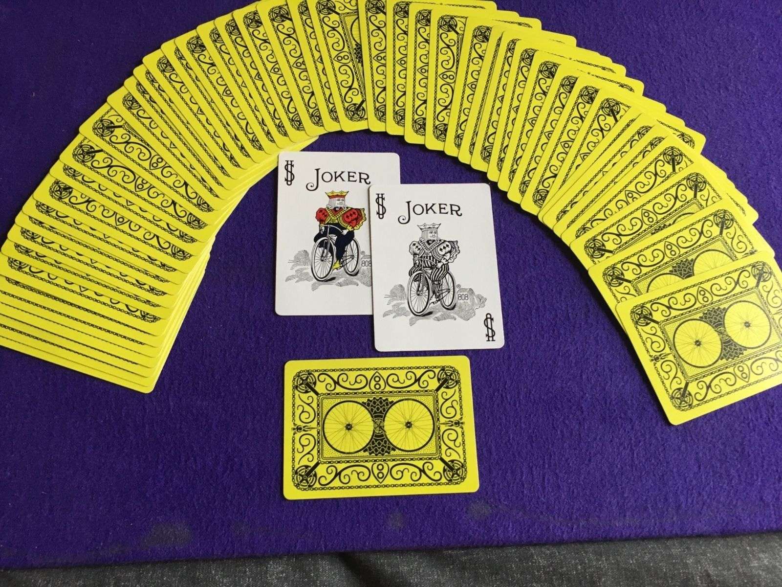2003-cyclist-neon-yellow-bicycle-playing-cards-1.jpg