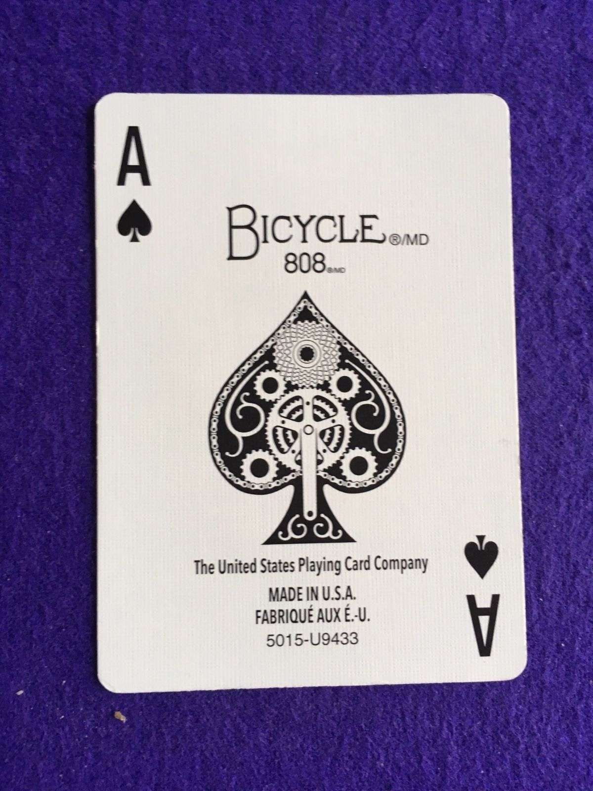 2003-cyclist-neon-yellow-bicycle-playing-cards-1.jpg
