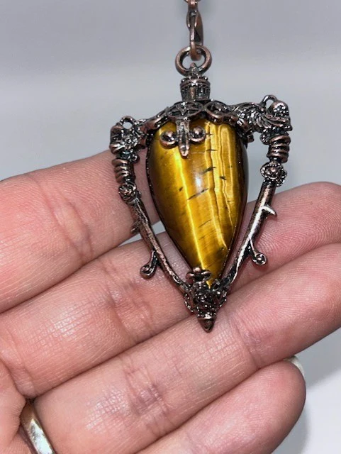Golden Tigerâs Eye Pendulum
