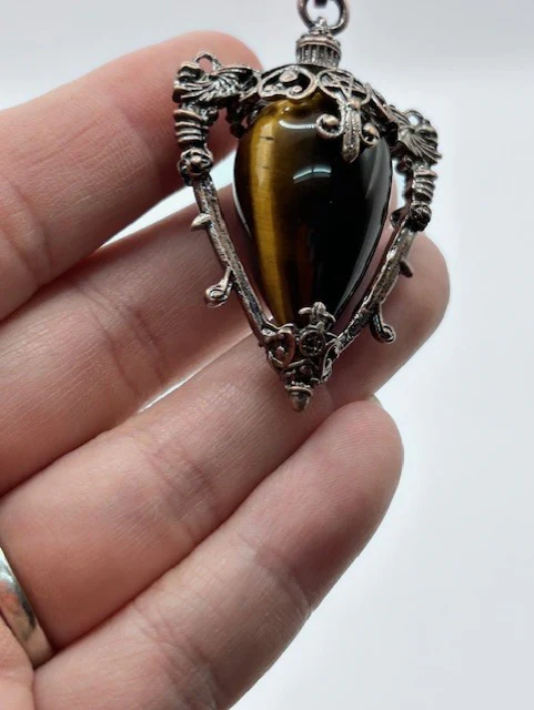 3128-golden-tiger-s-eye-pendulum-1.webp