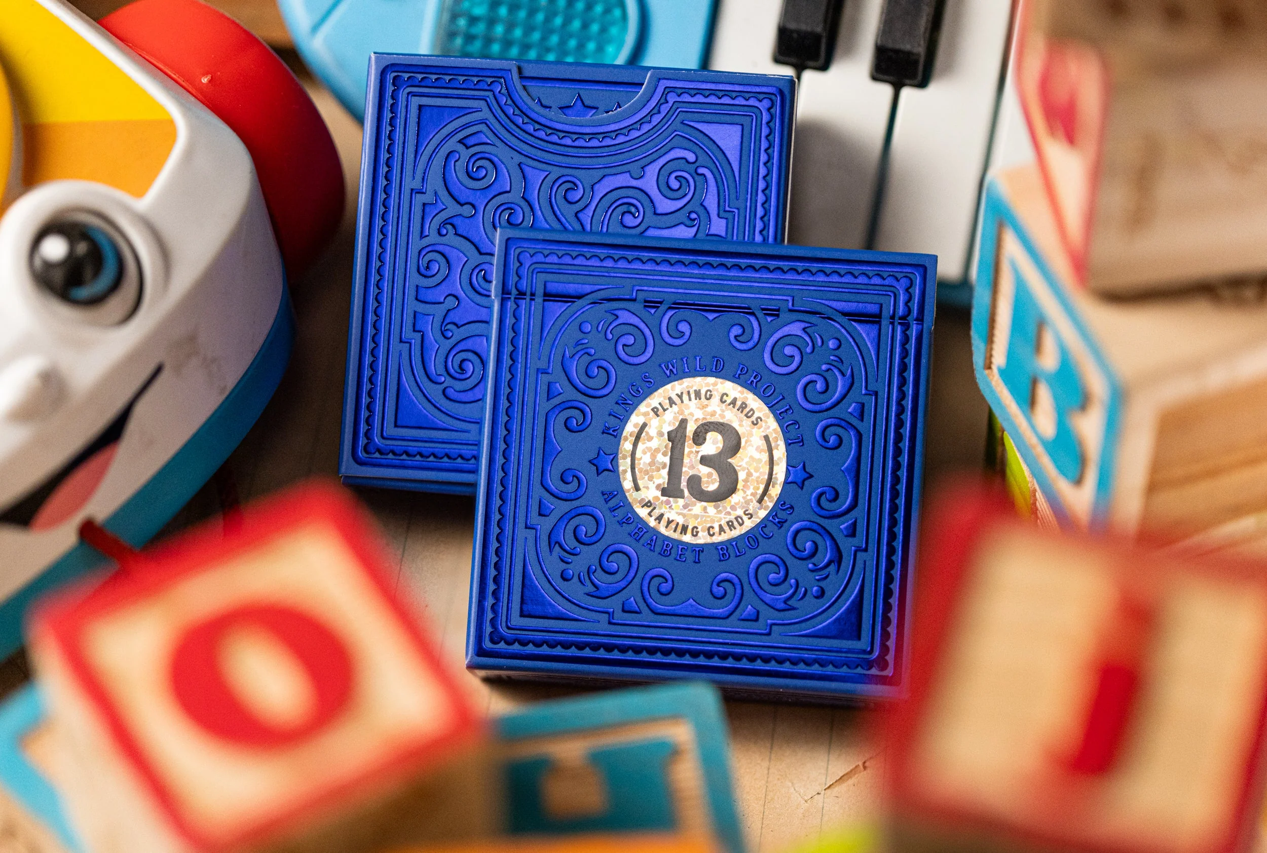 553-alphabet-blue-block-playing-cards-by-kings-wild-project-1.webp