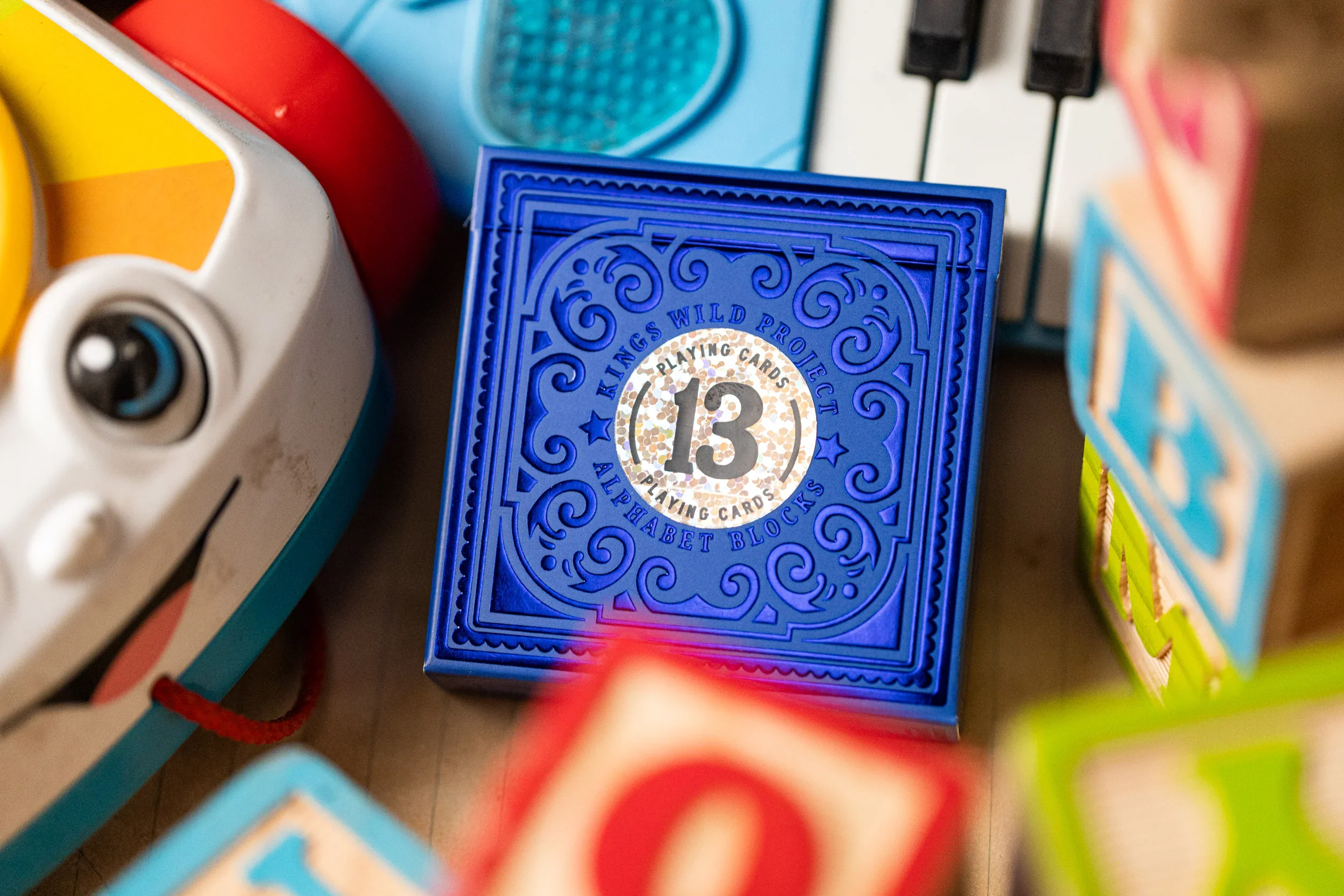 553-alphabet-blue-block-playing-cards-by-kings-wild-project-1.webp