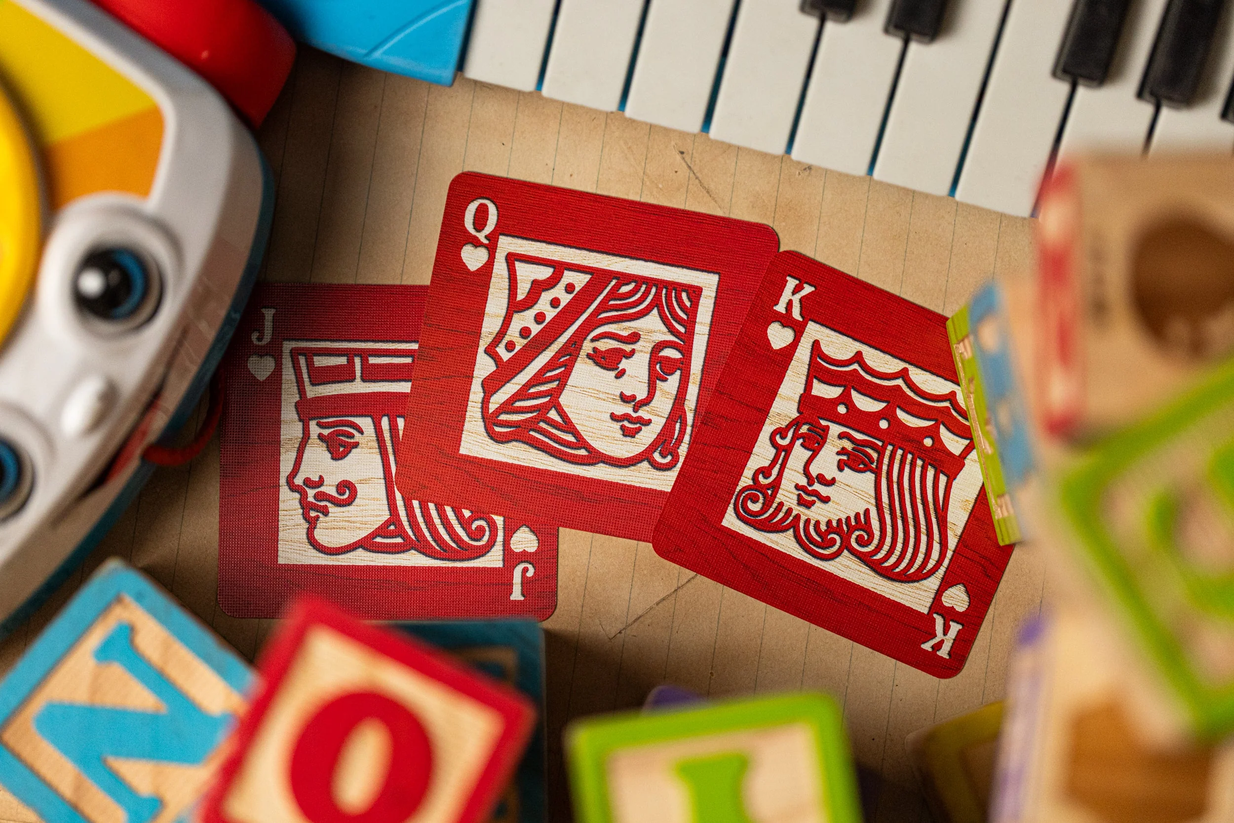 555-alphabet-red-block-playing-cards-by-kings-wild-project-1.webp