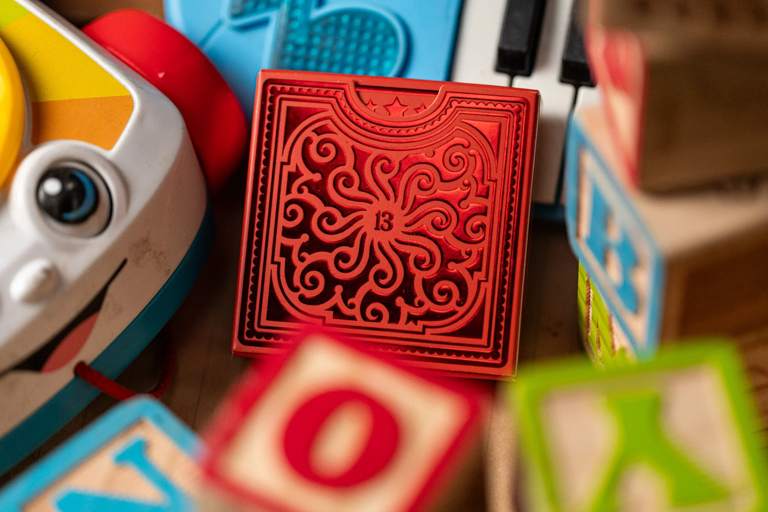 555-alphabet-red-block-playing-cards-by-kings-wild-project-1.webp