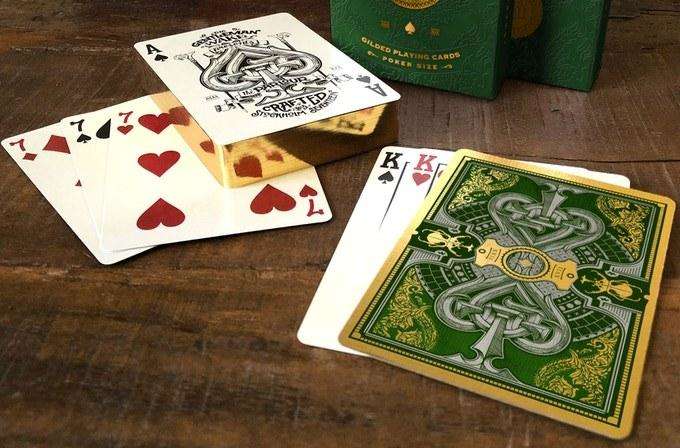 7061-the-parlour-dynastinae-gilded-playing-cards-cartamundi-1.jpg