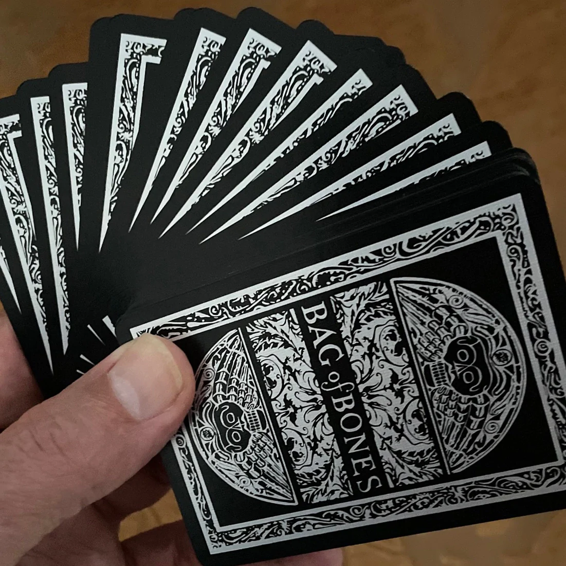 864-bag-of-bones-playing-cards-premium-silver-edition-1.webp
